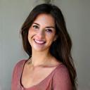 Headshot of a happy customer, Sarah L.